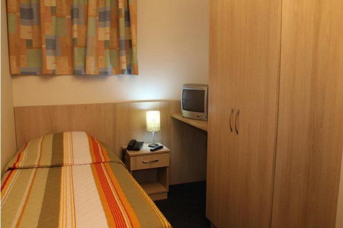 Euro Hotel Куритиба Стая снимка